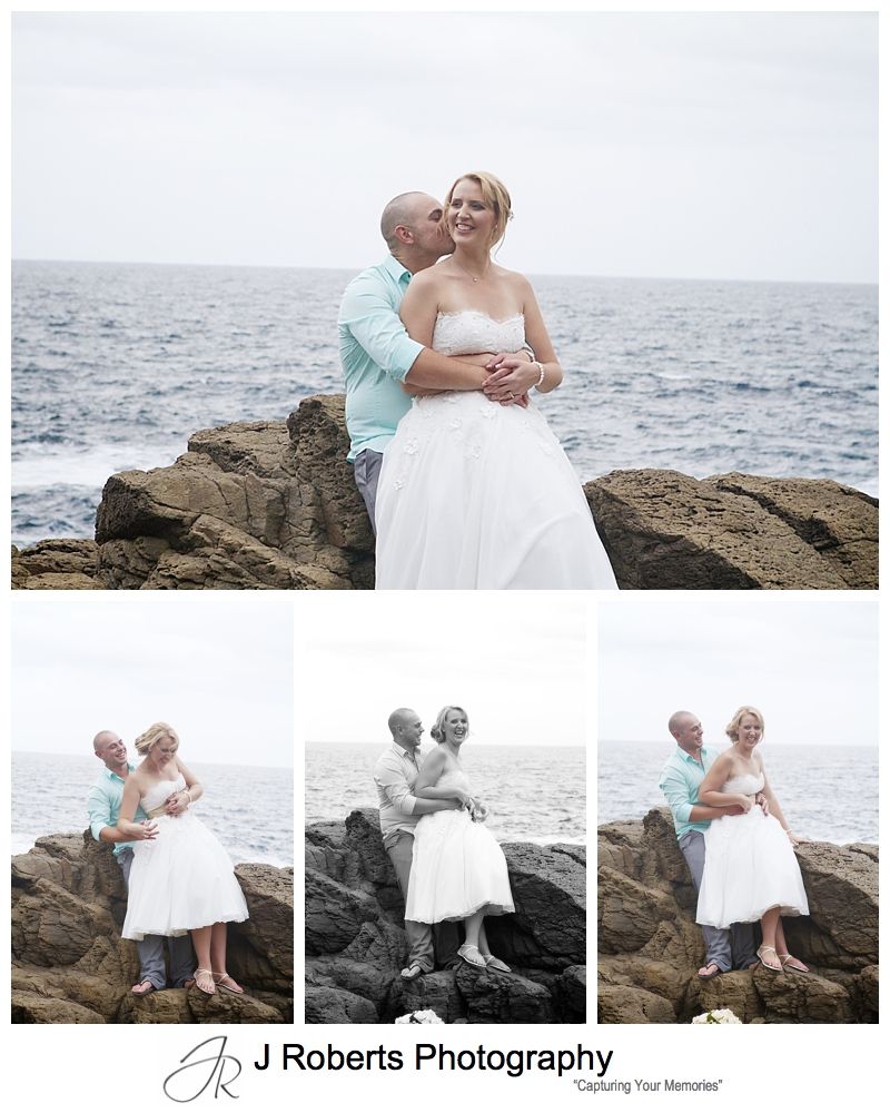 Bridal couple on the rocks at Kiama headland - sydney wedding photographer